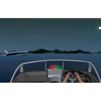 Night view from a boat's helm: another power boat ahead to the left, showing a green light
