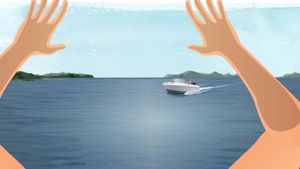 Boater using hand signals to indicate distress