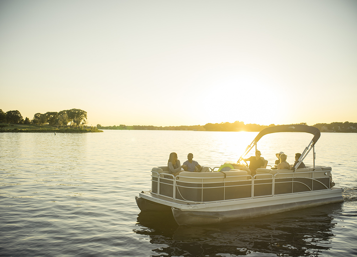 Pontoon boat in the sunset