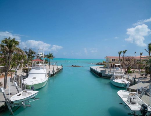 florida coast with moored boats along side of canal