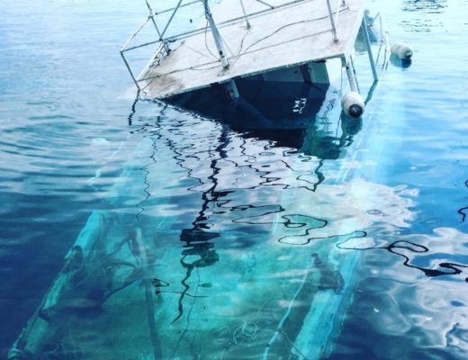 boat wreck half underwater